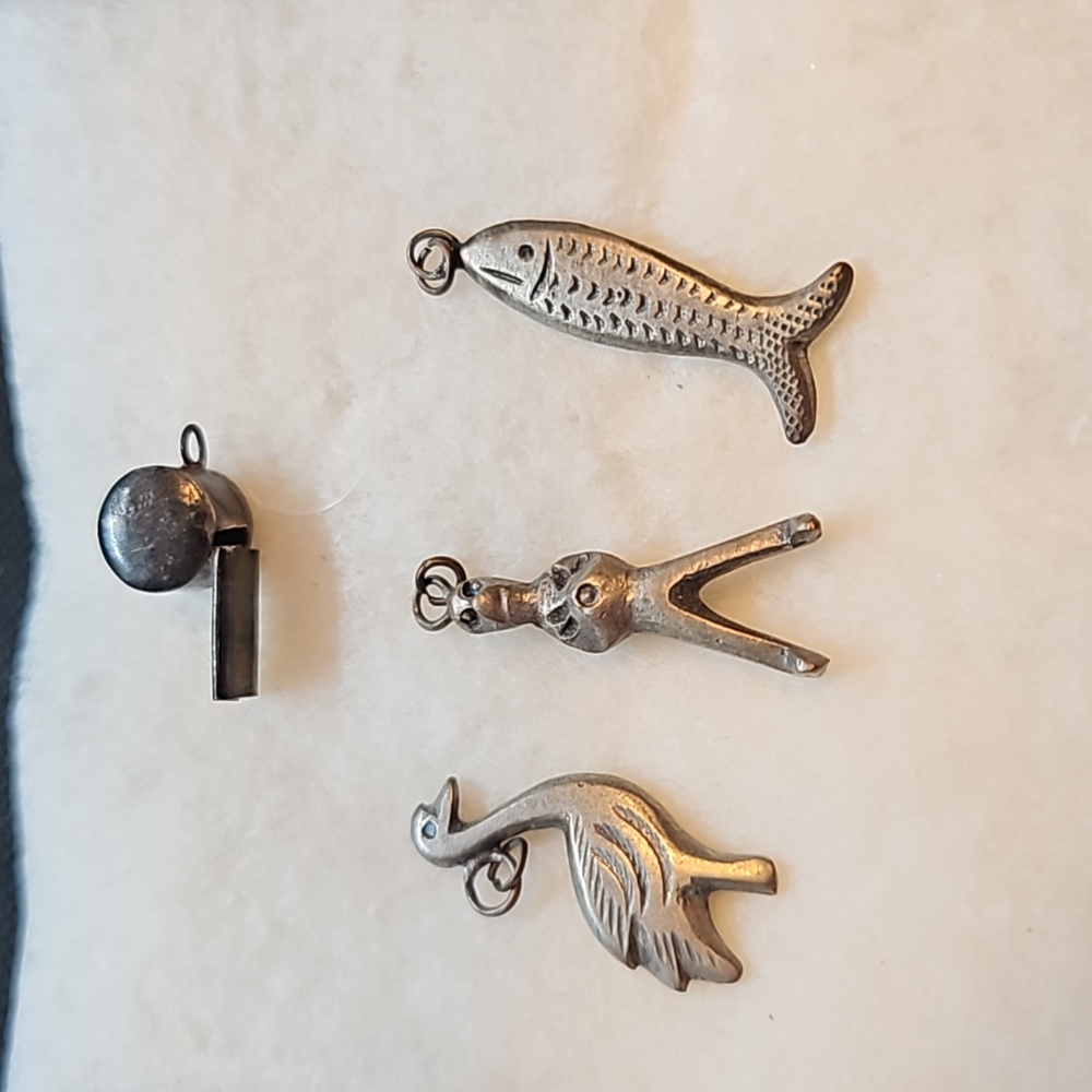 4 vintage pewter charms